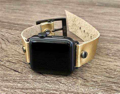 Black and gold apple watch band
